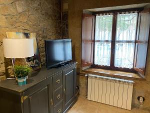 Η κουζίνα ή μικρή κουζίνα στο El Apartamentin - en el corazón del Parque Natural de Redes