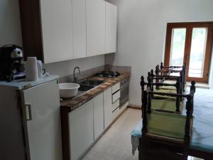 Kuchyň nebo kuchyňský kout v ubytování Agriturismo Val di Ferro