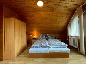 A bed or beds in a room at Apartmán na hranici