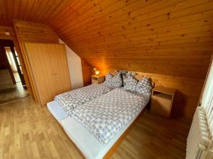 A bed or beds in a room at Apartmán na hranici