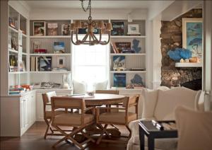 a dining room with a table and chairs at The Tides Beach Club in Kennebunkport