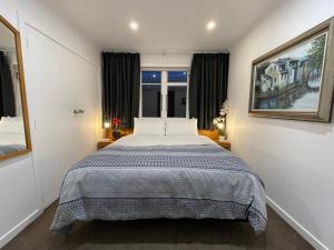 Katil atau katil-katil dalam bilik di Ocean Front East End Beach House