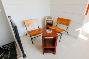 Posezení v ubytování S5 Guest House Yogyakarta