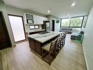 ครัวหรือมุมครัวของ Casa Arandas Hotel - Suits