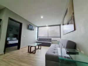 โทรทัศน์และ/หรือระบบความบันเทิงของ Casa Arandas Hotel - Suits