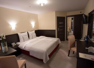 Кровать или кровати в номере Hotel Soray
