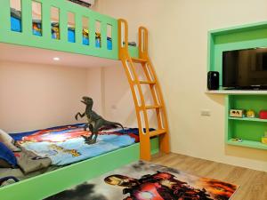 TV o dispositivi per l'intrattenimento presso 墾丁舍廷親子會館 KT13 Hotel