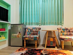 Area soggiorno di 墾丁舍廷親子會館 KT13 Hotel