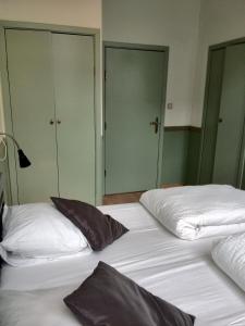 Кровать или кровати в номере Hotel Sabina