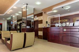 a hotel lobby with a reception desk and chairs at MPM Hotel Condor - All Inclusive Light in Sunny Beach