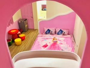 Letto o letti in una camera di 墾丁舍廷親子會館 KT13 Hotel