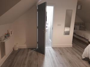 Postel nebo postele na pokoji v ubytování Glenbeg Lodge B&B