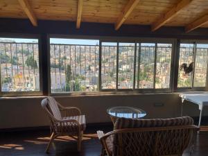 Imagem da galeria de Cozy wood apartment with great view to Nazareth na Nazaré