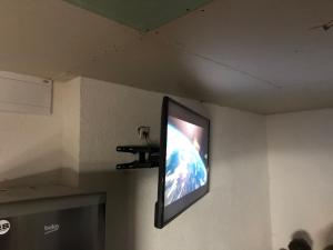 Televízia a/alebo spoločenská miestnosť v ubytovaní W apartmán 2