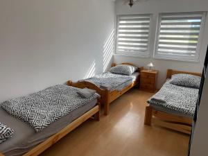 Posteľ alebo postele v izbe v ubytovaní W apartmán 2