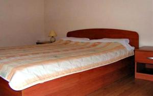 Postel nebo postele na pokoji v ubytování Seaside Apartments Laurus Murter