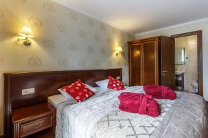 Postel nebo postele na pokoji v ubytování Romantik Spa Hotel