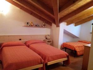 Postel nebo postele na pokoji v ubytování casa LUCIANER