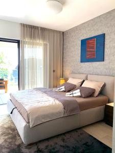 Ένα ή περισσότερα κρεβάτια σε δωμάτιο στο Luxury twin apartments Opatija +55 φωτογραφίες