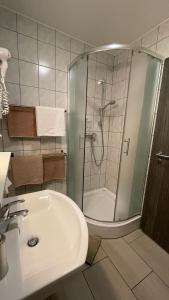 Kúpeľňa v ubytovaní Benevia Apartments + 19 fotografií