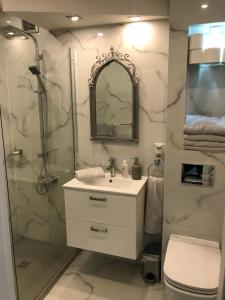 Kúpeľňa v ubytovaní Apartament Chanel Centrum