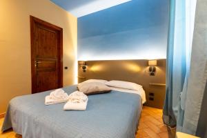 Agriturismo AgrileisureTime客房内的一张或多张床位