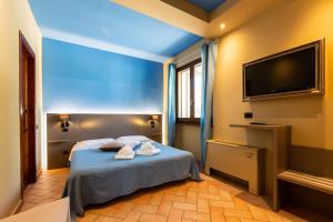 Agriturismo AgrileisureTime客房内的一张或多张床位