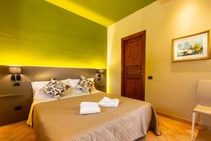 Agriturismo AgrileisureTime客房内的一张或多张床位