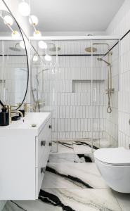 Kúpeľňa v ubytovaní Comfy Apartments - Lastadia LUX + 22 fotografií