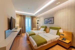 Μια τηλεόραση ή/και κέντρο ψυχαγωγίας στο ARTES HOTEL