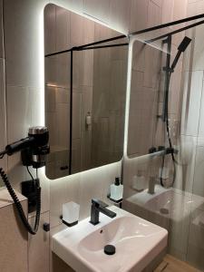 Koupelna v ubytování Da Home Urban Hotel self check-in