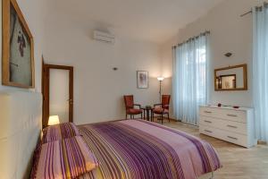 
Letto o letti in una camera di Apartments Florence - Libertà Loft
