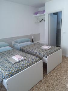 Postel nebo postele na pokoji v ubytování alloggio verona est S. Pietro