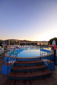 Bazén v ubytování Li Suari Club Village nebo v jeho okolí