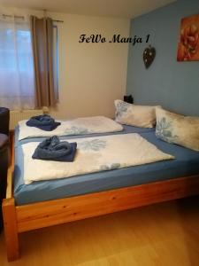Tempat tidur dalam kamar di FeWo Ückeritz /Manja