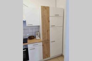 Kuchyň nebo kuchyňský kout v ubytování Stadtsuite mit Sauna in Wiener Neustadt 135 m2