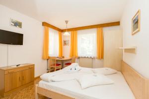 Postel nebo postele na pokoji v ubytování Appartement Sonneck
