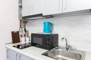 Køkken eller tekøkken på Metalist stadium district + 7 billeder