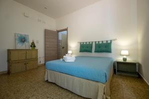 Postel nebo postele na pokoji v ubytování Hotel Soleo