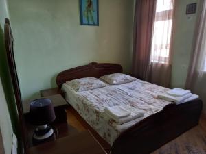 Voodi või voodid majutusasutuse Old House toas