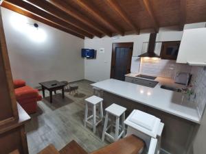 Kuchyňa alebo kuchynka v ubytovaní Apartamentos rurales Casa Gorrión - Mazaricos