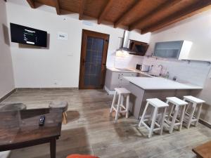 Kuchyňa alebo kuchynka v ubytovaní Apartamentos rurales Casa Gorrión - Mazaricos
