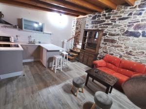 Kuchyňa alebo kuchynka v ubytovaní Apartamentos rurales Casa Gorrión - Mazaricos + 26 fotografií