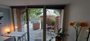 an outside view of a room with a patio at La cigale et la fourmi in Nîmes