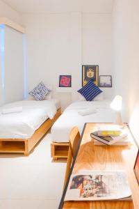 Кровать или кровати в номере Tengah Tengah