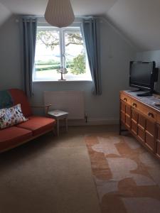 Μια τηλεόραση ή/και κέντρο ψυχαγωγίας στο Larksfield Loft