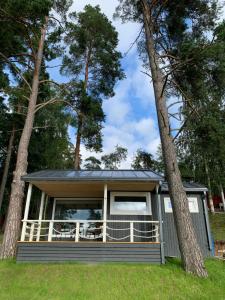 a rendering of a tiny house with a solarium at Usma DZ in Usmenieki