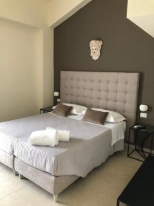 Posteľ alebo postele v izbe v ubytovaní Villa Iiulia Hills