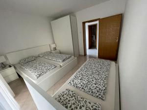 Säng eller sängar i ett rum på Tole Villa Podaca
