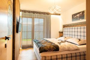 Postel nebo postele na pokoji v ubytování Skyberg Chalet
